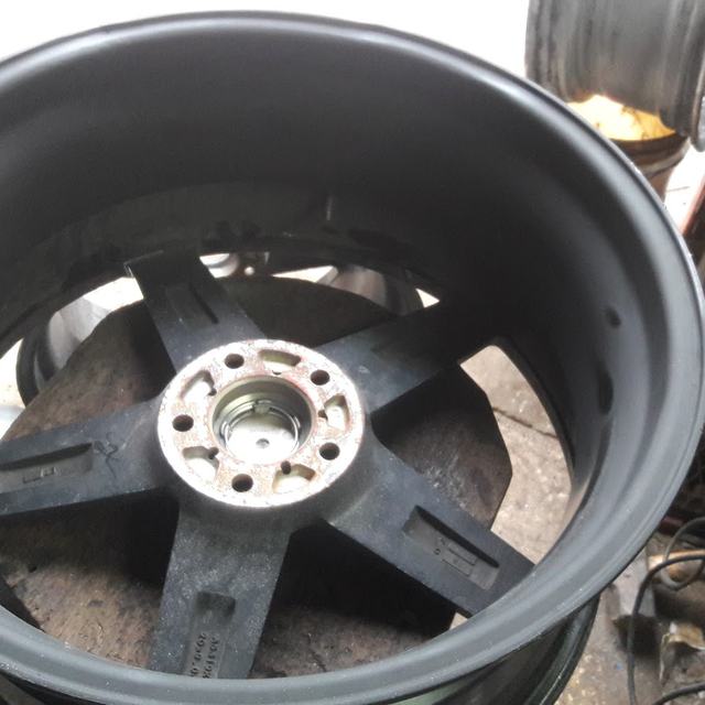 Alloy rim being repaired